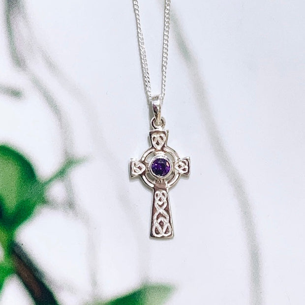 celtic cross with purple stone